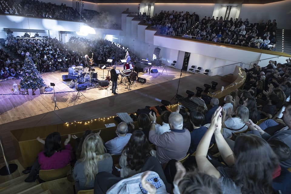 El Palau de la Música presenta una fila cero en el Nadal Solidari, apoyando a los afectados por la DANA.